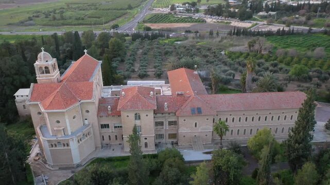 Aerial view of the Monastery of the Silent Ones located in Latrun at the southeastern end of the Ayalon Valley at sunset in Israel