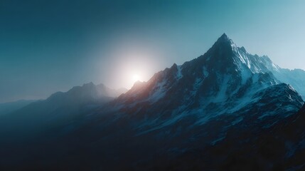 Obraz premium Majestic snow capped mountain range illuminated by a dramatic sunrise casting warm light and shadows across the vast landscape
