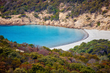Obraz premium the bay of Roccapina with its stunning turquoise sea and empty sandy beach seen from above