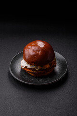 A burger, a hamburger with cheese, beef, and a bun, is unhealthy takeaway food. A burger