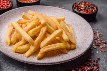 French fries are salty, crispy, and fried in oil, unhealthy takeaway food. French fries