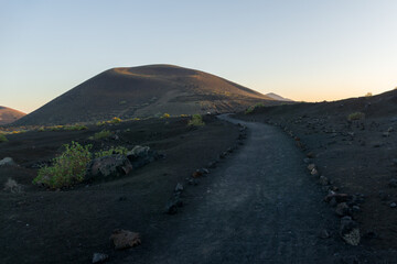 sunset in the volcano landscape of Timanfaya in Lanzarote
