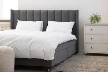 Beautiful room with comfortable bed. Interior design