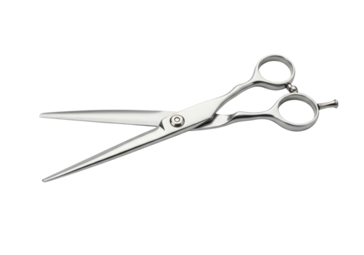Isolated silver-tone shears with offset handle and narrow blades for precision haircutting