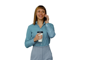 Businesswoman talking on smartphone and holding coffee to go, walking confidently and smiling, transparent background