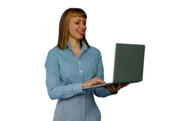 Woman working on laptop, smiling, using technology for remote business communication and digital tasks