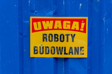 Warning Sign on Blue Metal Fence © Fotolixir