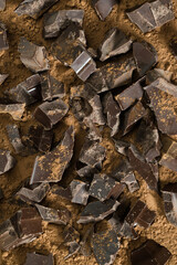 Chocolate pieces and crumbs background
