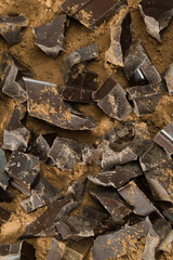 Chocolate pieces and crumbs background