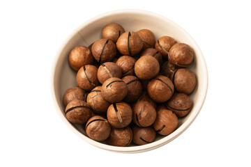 Macadamia nuts in a shell isolated on a white background.
