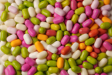 Sweet multicolored candies isolated on white background.
