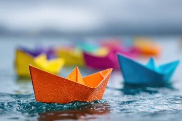 Colorful paper boats floating on water during a cloudy day in a serene outdoor setting