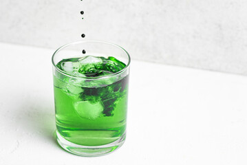 Liquid Chlorophyll Drink. Glass of Chrorophyll Water.