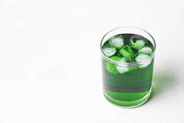 Liquid Chlorophyll Drink. Glass of Green Chrorophyll Water.
