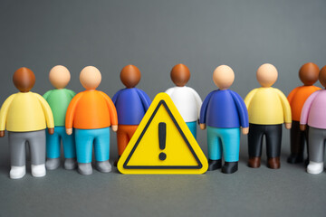 A crowd of people and a sign of attention. Social issues and topics of interest to society. Awareness, protest, and public communication. Politics, sociology, and media discussions.