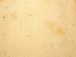 This textured beige background is ideal for various design projects and artwork