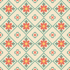 Retro geometric floral tile seamless pattern in red, green, and cream tones. Classic Nyonya or vintage ceramic tile background design.