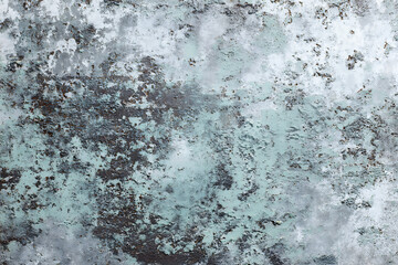 Weathered textured surface featuring a distressed mix of gray, white, and turquoise tones with oxidized brown patches.