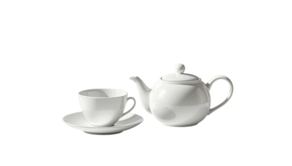 Elegant teapot with matching cup and saucer isolated on transparent background