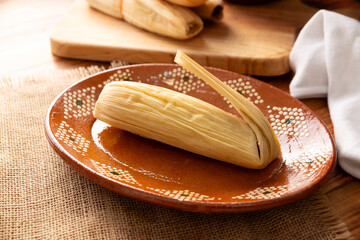 Tamales. Traditional food typical of Mexico and some Latin American countries. Corn dough wrapped in corn leaves. The tamales are steamed.