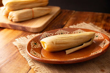 Tamales. Traditional food typical of Mexico and some Latin American countries. Corn dough wrapped in corn leaves. The tamales are steamed.