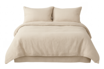 Comfortable beige bed bedding with duvet cover and pillows