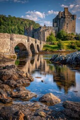 Ancient stone castle and bridge reflected in tranquil water, with lush green foliage