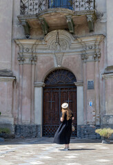 Young woman in a black dress