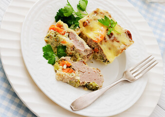 Cheesy ground meat vegetables casserole on a plate