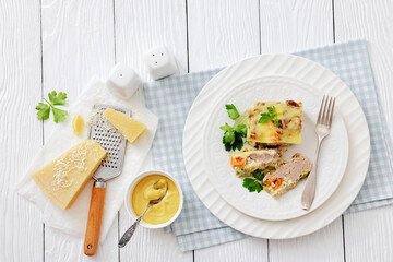 Cheesy ground meat vegetables casserole on a plate