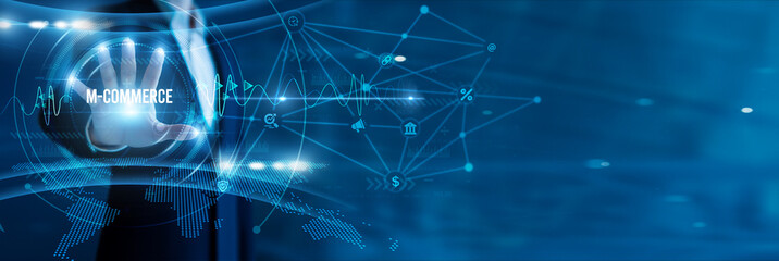 Businessman hand hold text M-Commerce, mobile payments, app-based shopping, customer convenience, e-wallet integration, on-the-go transactions, and personalized user experiences.