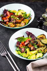 Healthy vegan keto salad with tofu and avocado