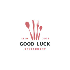 Fototapeta premium Elegant restaurant logo design showcasing flatware for branding identity and modern food business promotion, symbolizing culinary excellence and stylish dining