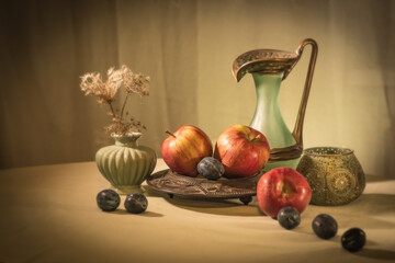 Beautiful background with apples and plums