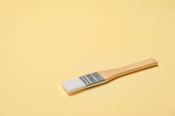 One new big size flat paintbrush is for painting, crafting, art projects, and detailed hobby work. Tool of artist. New brush. Drawing tassel side view. High quality photo