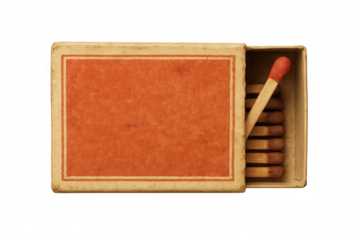 Old half-open matchbox with a stack of matches and an empty red label, showing vintage fire starter