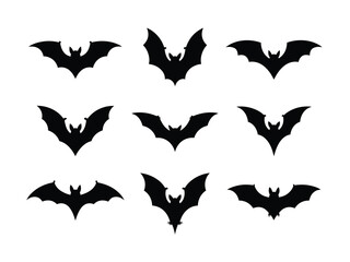 Naklejka premium Collection of nine black bat silhouettes in flight on a white background