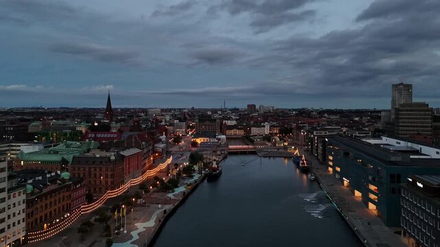 Scenic Malm&ouml; skyline captured by drone on warm summer night
