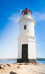 Lighthouse Tokarevskaya koshka with vane anemometer in Vladivostok