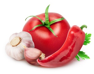 Pile of vegetables. Fresh tomato, garlic with segment, red pepper, parsley leaves isolated on white background