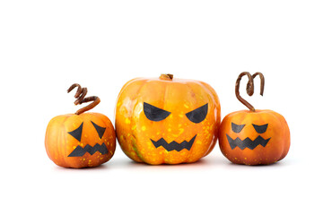Cute Halloween pumpkins with jack-o'-lantern faces arranged in a playful group on a white background