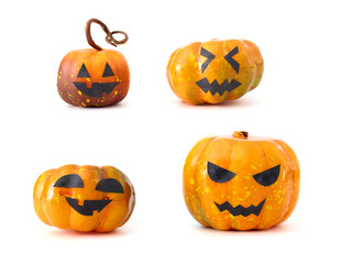 Cute Halloween pumpkins with jack-o'-lantern faces arranged in a playful group on a white background