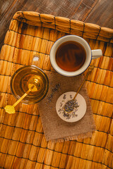 flat lay of Rustic Tea Scene with Lavender and Two Mugs