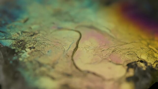 Geology Gloss gloss geology with thin-film interference &mdash; gentle motion; royalty‑free look; no banners or text; no faces; no trademarks scene 1