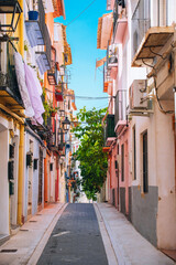Villajoyosa street with typical colorful houses. La Vila Joiosa city, Alicante Province, Valencian Community, Spain