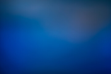 Abstract smooth blue gradient background with soft transitions from deep navy to bright azure, creating a calm and modern visual effect.