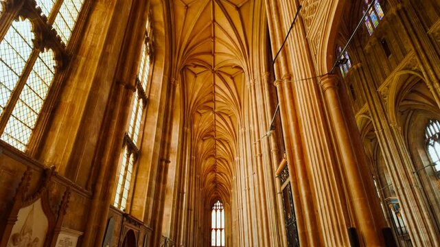 Interior of Canterbury Cathedral, Canterbury, Kent, England, UK, a UNESCO World Heritage Site, with soaring arches, choir stalls and patterned flooring