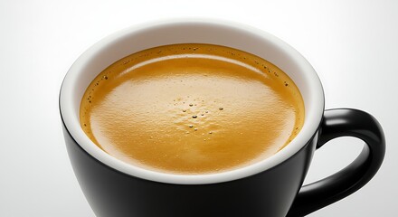 A freshly brewed cup of hot espresso coffee with a rich golden crema in a black ceramic mug