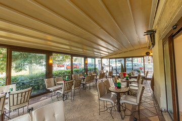 Interior of a open cafe bar street garden