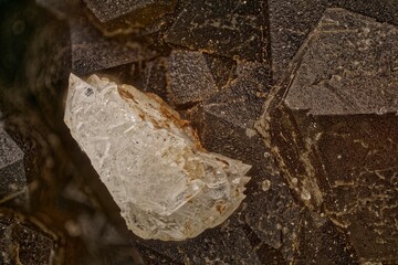 Macro datolite and almandine from Dalnegorsk, Bor deposit- transparent crystals and dark garnet. Microphoto at 4x: Valuable image for science, education and scientific research